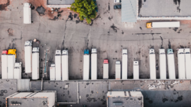 aerial view of cargo trucks at loading docks