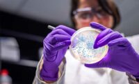 woman in a lab running tests