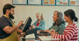 man taking order in a fast food restaurant