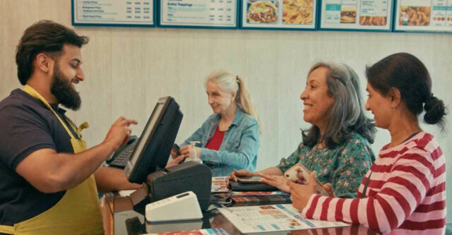 man taking order in a fast food restaurant