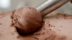 chocolate ice cream being scooped