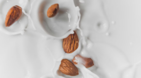 almonds splashing in milk