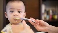 baby eating food