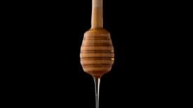 honey dripping from a wand