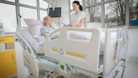 nurse caring for a patient in a hospital