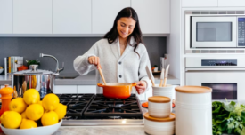 woman cooking in home kitchen