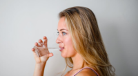 woman drinking glass of water