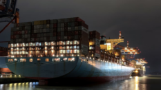 cargo ship in harbor at night