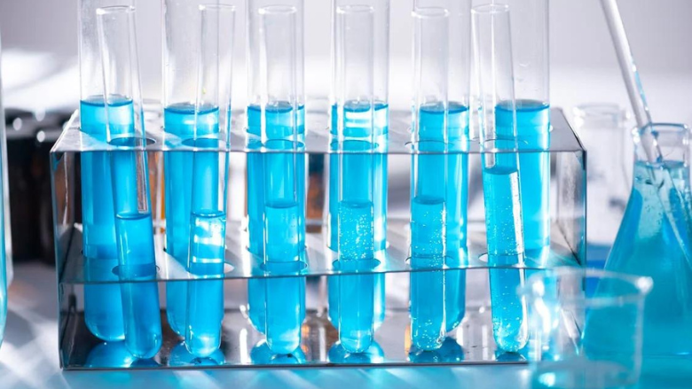 lab test tubes with blue liquid