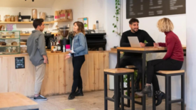 people at a quick service coffee shop cafe