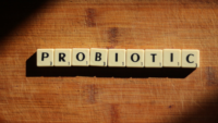 scrabble tiles spelling out probiotic