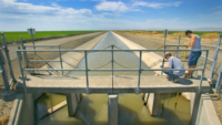 two men testing a california community water system