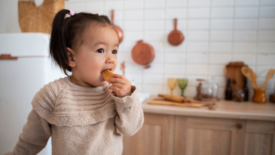 a toddler eating