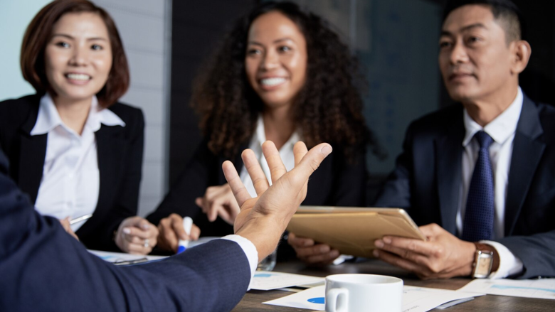 meeting of businesspeople in suits board of directors