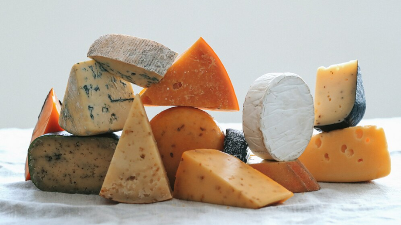 variety of aged cheeses