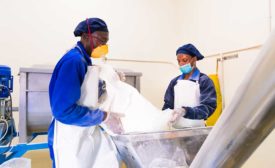 two men working in milk powder factory